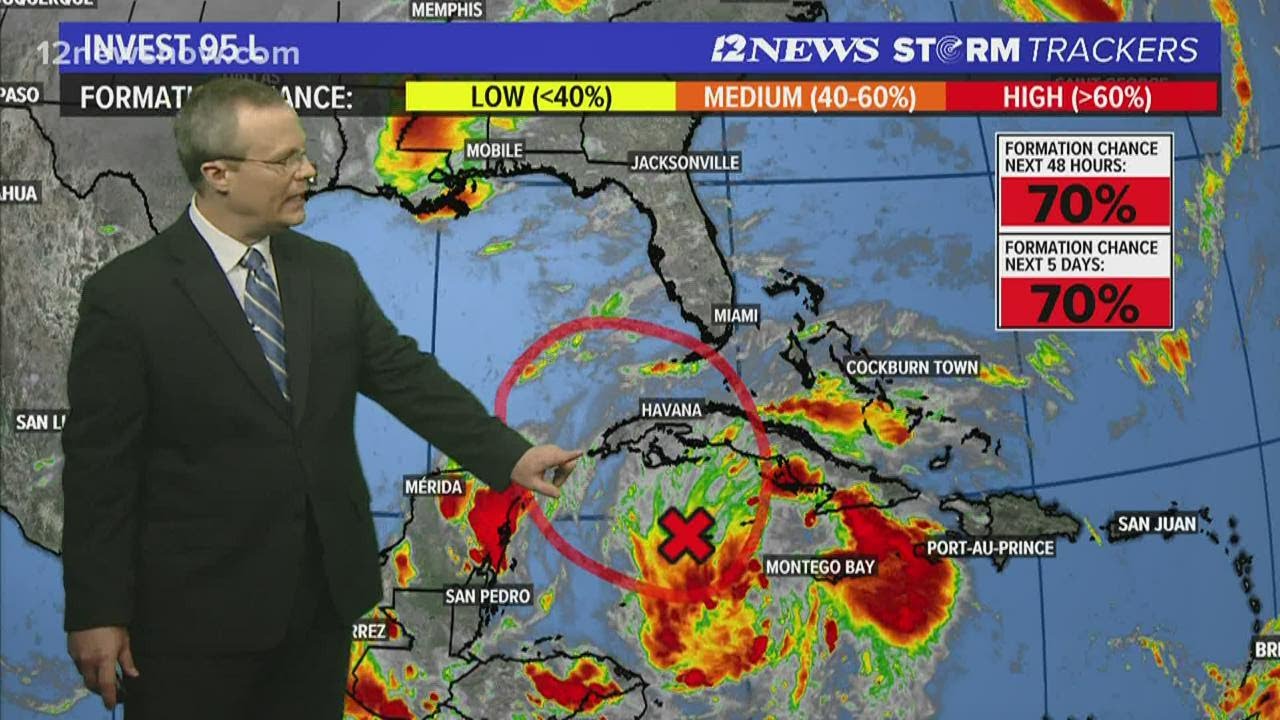 Friday afternoon thunderstorms moving through, now tracking Invest 95L ...