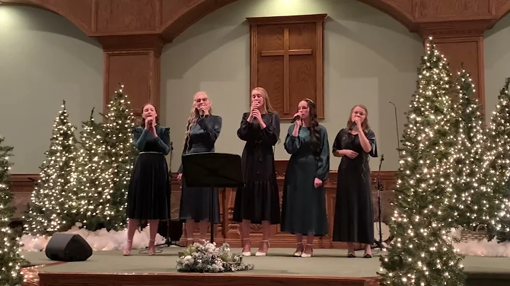 Breanna Chambers and the girls singing at the Christmas Singing at Church.