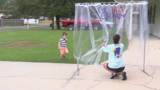 Louisiana grandmother creates hugging curtain in age of social distancing
