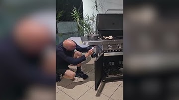 Aussie Snake Catcher Finds Carpet Python in BBQ Grill