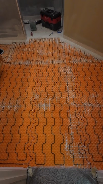Schluter heated floor wire installation🟧 #construction #bathroom #