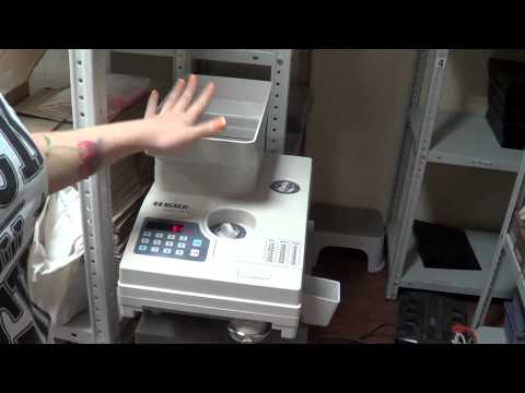 How do use a MAGNER coin counting machine