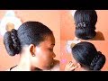 Un chignon bas plaqu sans gel sur cheveux crpus