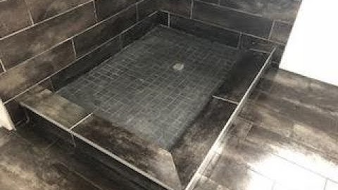 How to install a tile shower curb