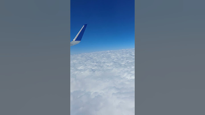 Cotton candy clouds. View from plane. Up above the sky. Indigo fly India. Rainy season monsoon