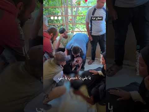 وداع أب فلسطيني لنجله شهيداً في قصف إسرائيلي برفح
