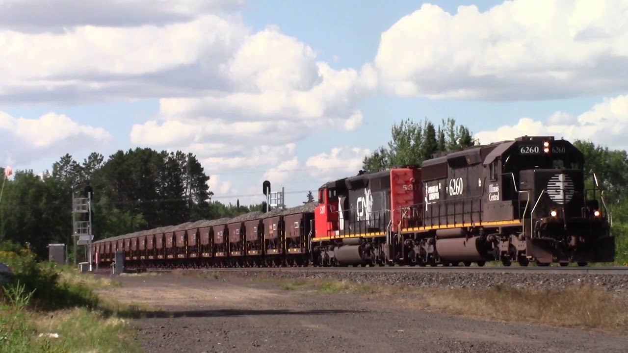IC 6260 and a CN SD40-2W head South/West with a loaded ore train.