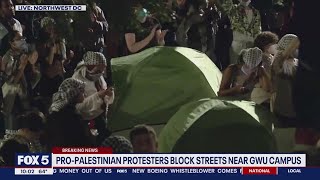 Pro-Palestine protesters rally outside GWU administrative offices