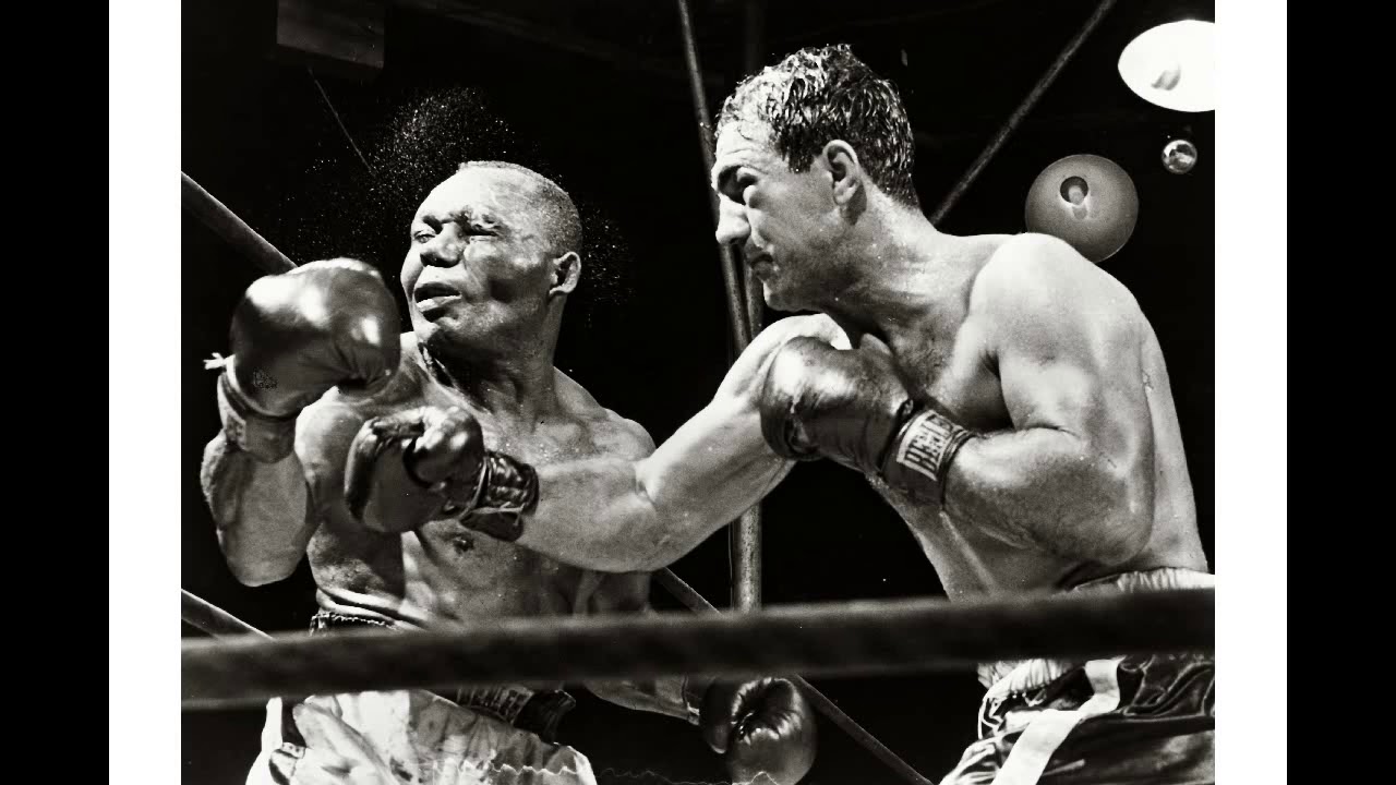 Rocky Marciano KO's Jersey Joe Walcott,boxers,knock outs,sports