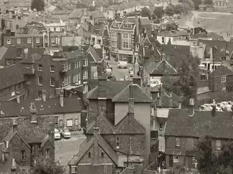 This is an animation of a single unique photograph of the Dorset town of Poole taken in 1963. It was shot from the top of a harbourside grain silo (where the Asda tower now stands) just prior to much of the old town's destruction to make way for new development. The scene today is almost completely unrecognisable, now being replaced by the usual suspects. The loss of the old town also meant the loss of its ancient soul, and the fragmentation of the Poole families who had lived and worked there for centuries. Poole was sadly one of the many victim townships to fall foul of the post war mania to quickly usher in the new. Today, such an important architectural heritage would be saved and restored for the nation and the benefit of future generations. Fortunately, the area around the main quay survived the wrecking crew, and serves as a fine example of the architectural beauty that Poole once enjoyed on a much larger scale.