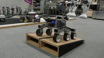 Rocker Bogie Rover going up and down a step and a slope