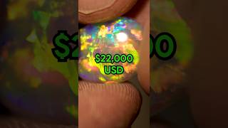 Risked cutting away gem crystal opal color for higher value
