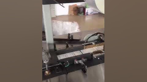 Automatic three dimensional cigarette wrapping machine