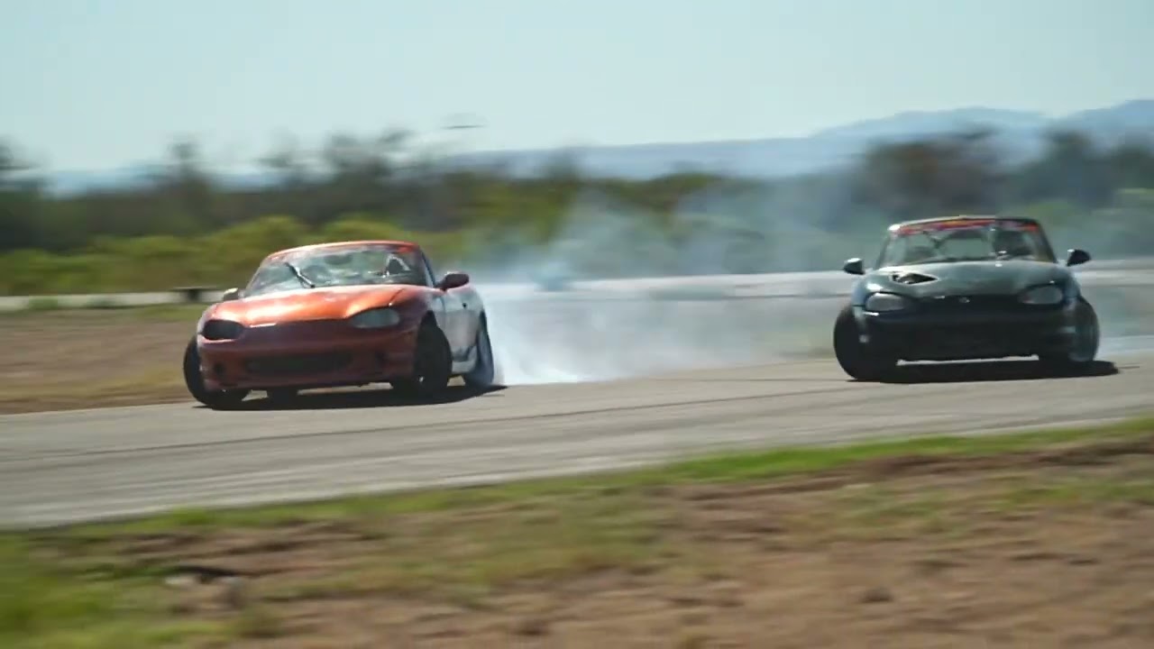 2 supercharged nb miatas getting sideways!