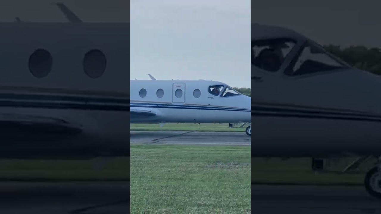 Beechcraft beechjet 400A taxiing on runway Alpha for departure at Cape May Airport