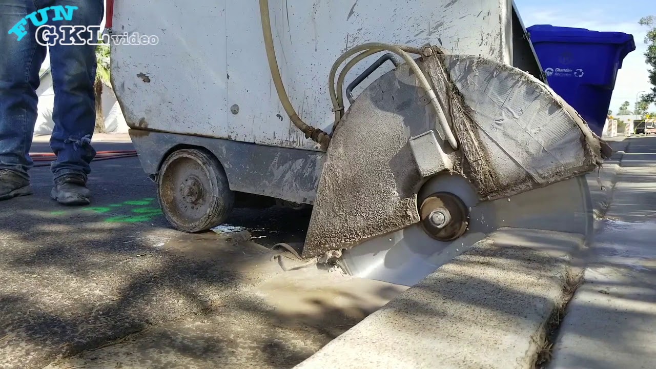 Cutting Concrete with Diamond Blade - Giant Cool Saw Blade Cut Street and Sidewalk