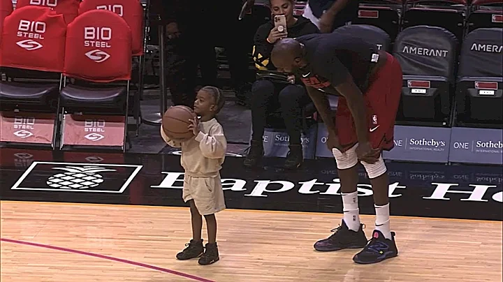 Dewayne Dedmon Warming Up with His Son