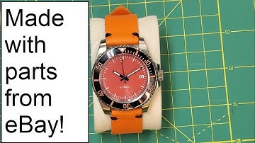I made this orange Submariner Homage with parts from eBay! You can build an auto watch at home!