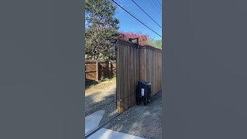 Board on board cedar fence with motorized gate - North Dallas, Texas 75220