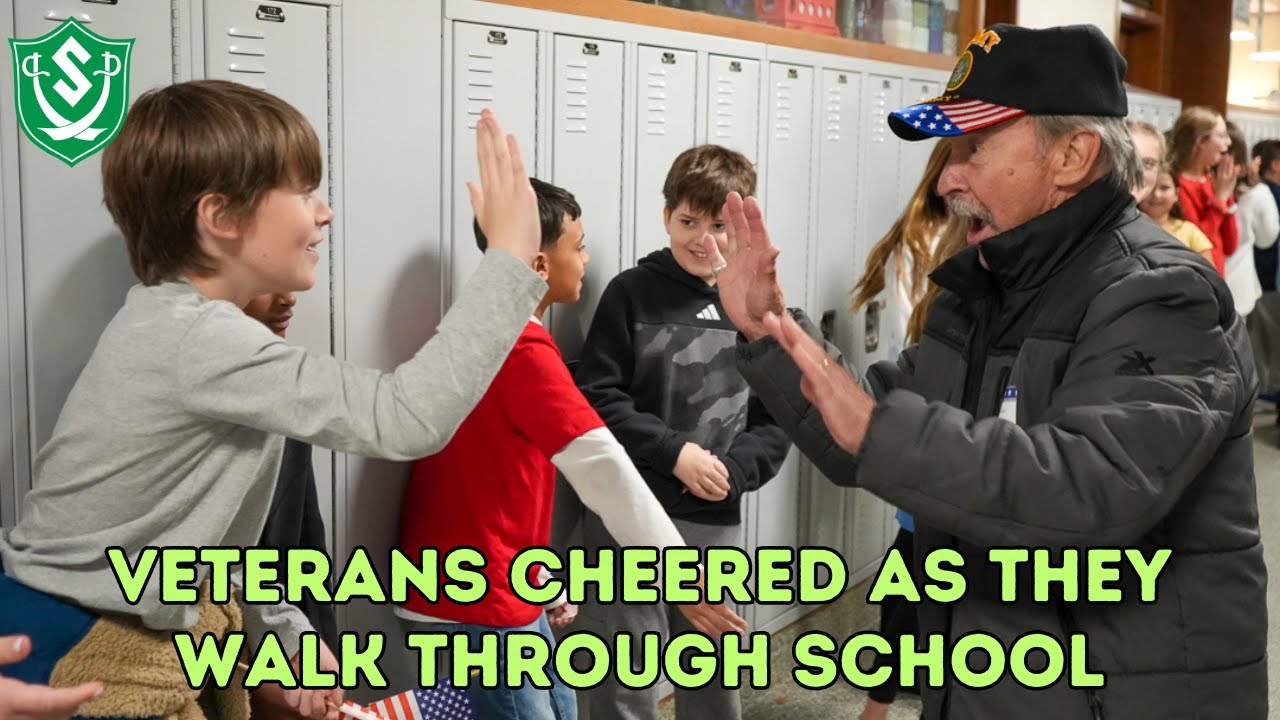 Veterans Cheered as They Walk Through School - YouTube