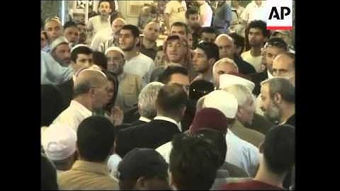 Turkish FM Babacan visiting Al-Aqsa mosque, meeting Peres
