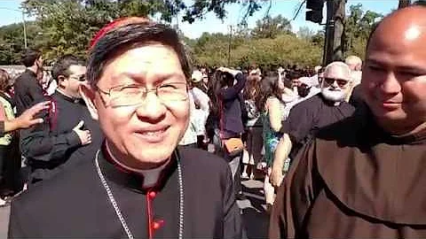 Cardinal Luis Antonio Tagle speaks with Br. Roger