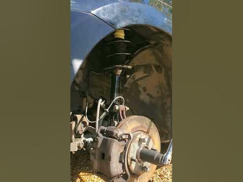 2012 nissan sentra front suspension spring install pt 7 - YouTube