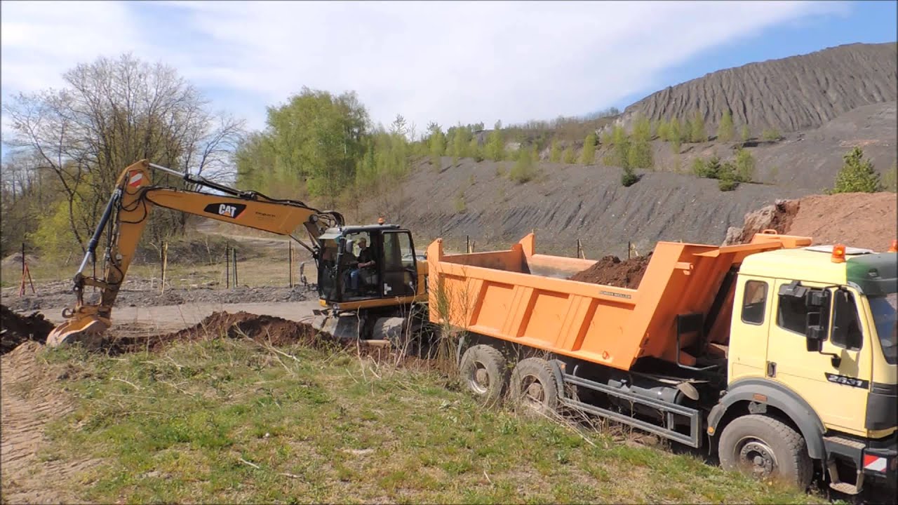 Caterpillar M315D Loading Mercedes 2631 [1080p]