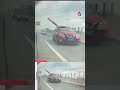 Metal bar pierces passing car after truck hits height barrier in China