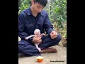 Playing while eating yogurt, the baby monkey is so lively
