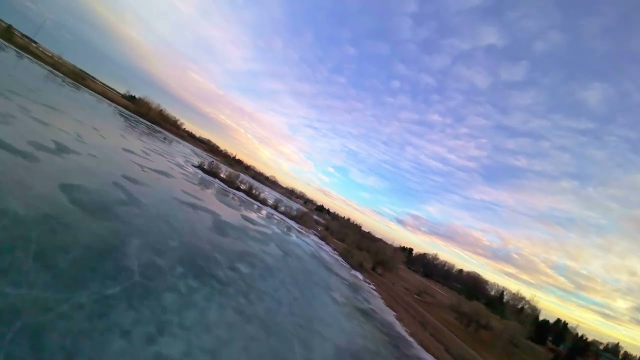 DJI Avata 2 flight over a frozen Lake