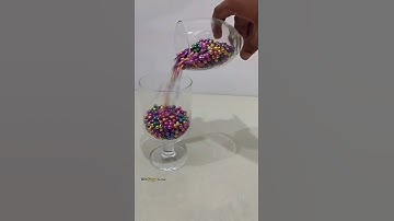 Colourful Pearls Are Moving to Another Glass. #reverse #satisfying # #asmr #oddlysatisfying #shorts