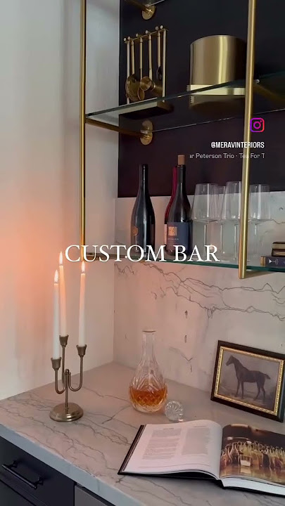 Beautifully designed home bar - moody, intimate, and fully custom complete w/ quartzite countertop!