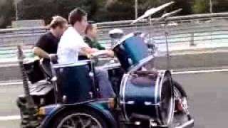 People Playing Live Music On The Highway