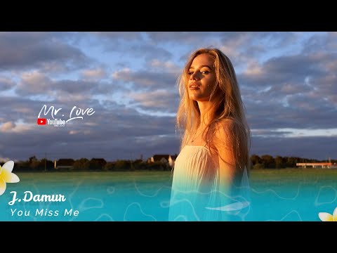 J Damur -