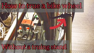 How to true a bike wheel without a truing stand