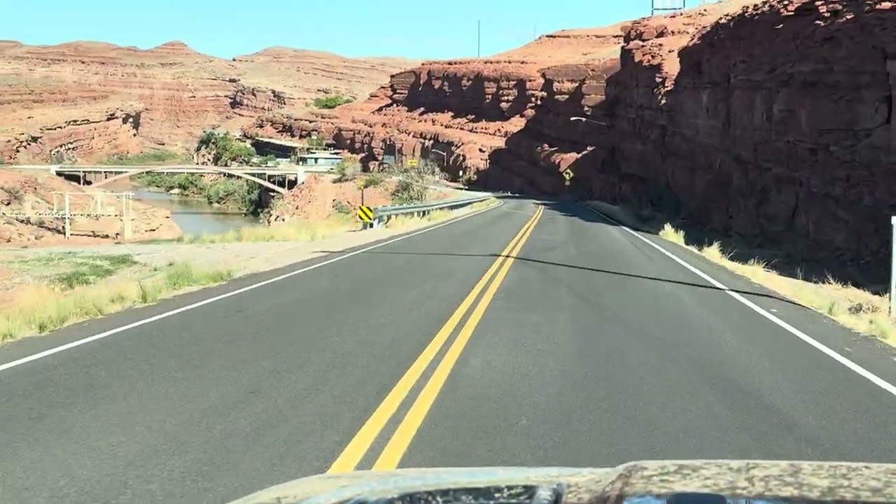 Driving through Mexican Hat Utah - population 18. San Juan River is a popular rafting destination!
