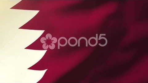 Qatar Flag Waving In The Wind. Looping Sun Rises Style. Animation Loop