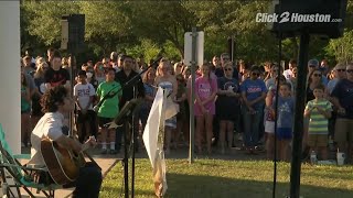 Vigil held for family killed by fugitive