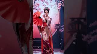 Woman in a traditional Japanese kimono, performing a graceful fan dance on the AGT stage#shortsviral