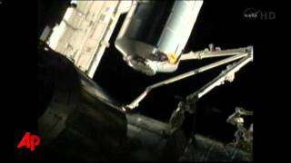 Raw Video: Storage Bin Loaded on Space Shuttle