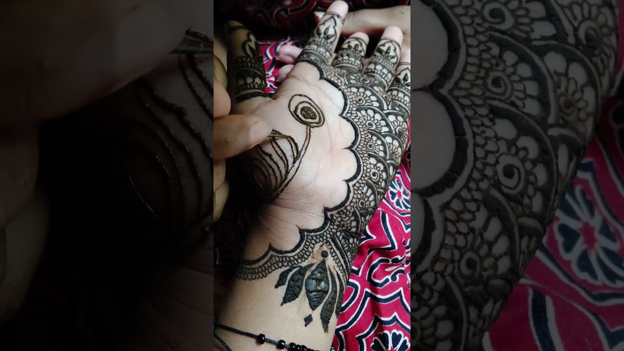 The Most Extravagant Henna Peacock Feather Mehndi Design