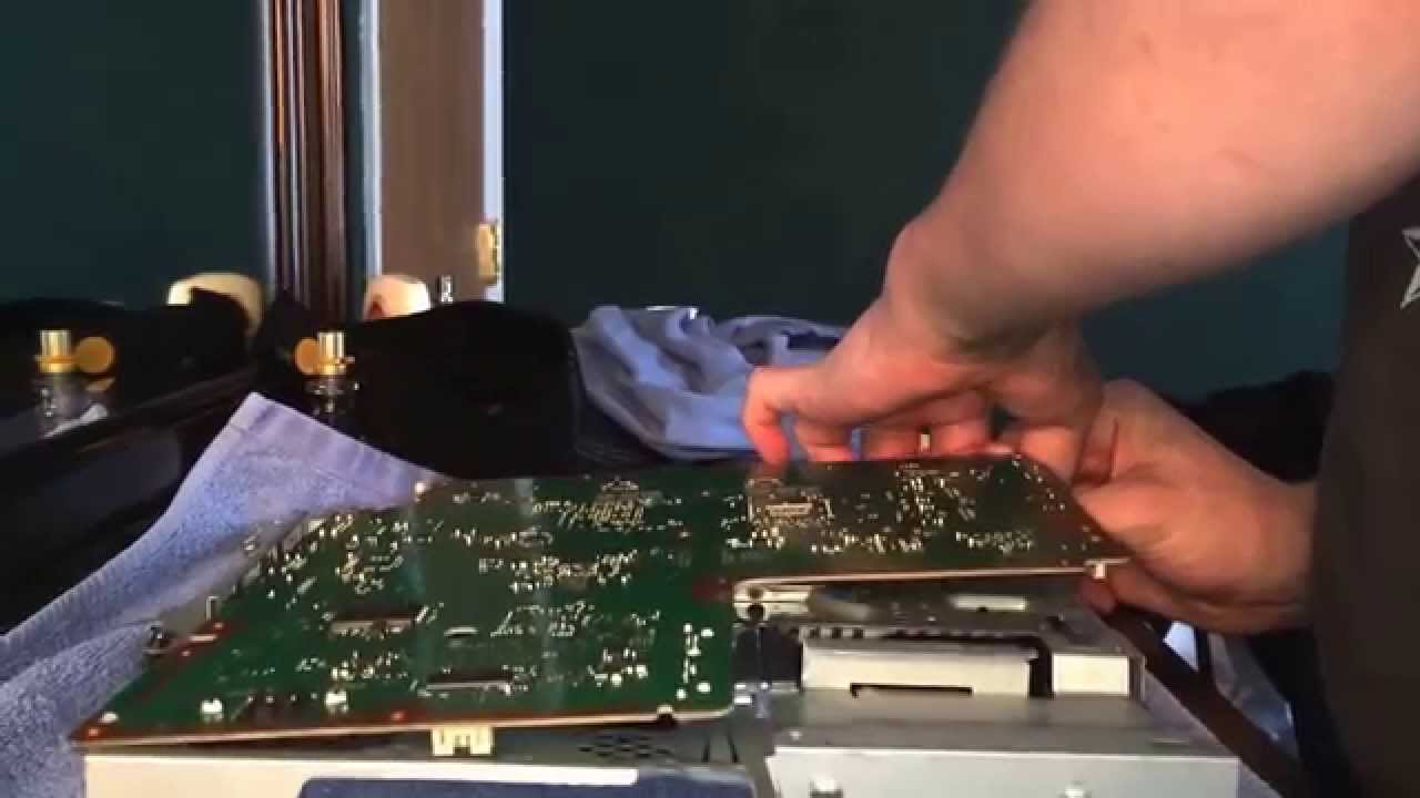 How to take apart a slim PS3, and install E3 NOR Flasher clip. - YouTube