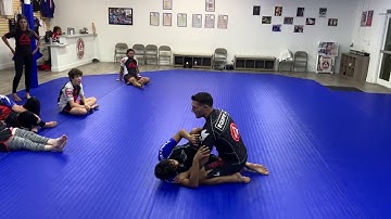 Gracie Barra Jupiter Half-Guard Pass using kimura grip