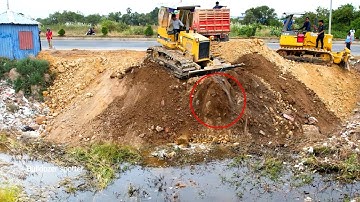 Amazing !! Skill operator Bulldozer working push Stone Landfill With Team dump truck Unloading stone