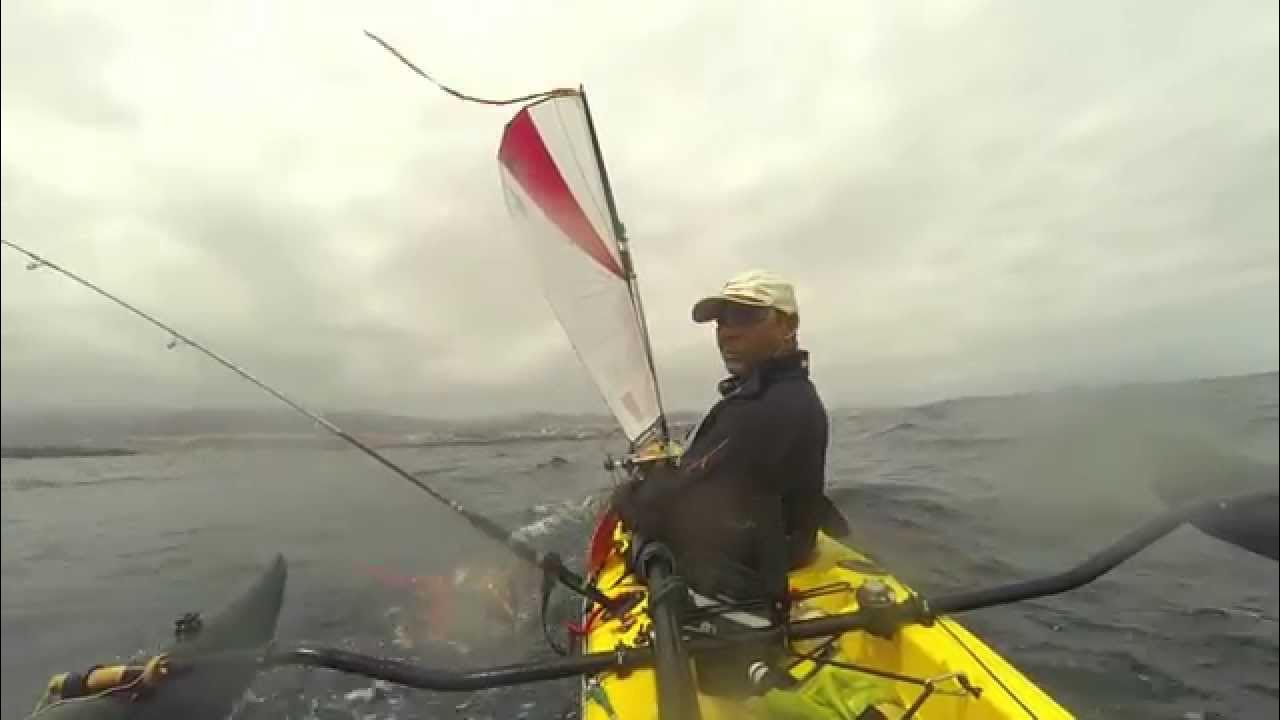 Kayak sailing. OK Trident 13 with Kayaksailor and outriggers hobie a