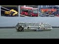 Damaged JCBs, Buses & Cranes Being Unloaded From The Salvaged Ship Hoegh Osaka.