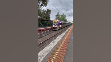 Vlines passing through Oak Park and Newmarket bound for Southern Cross