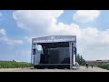 Portable mobile stage trailer with light and sound system for outdoor concert performance events