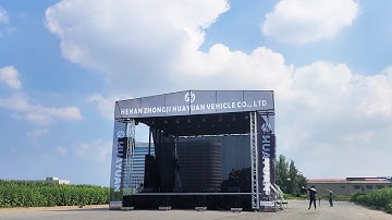 Portable mobile stage trailer with light and sound system for outdoor concert performance events